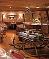Buendner Stube is located in a very quaint part of the Tschuggen Grand Hotel and is known for its friendly atmosphere and comfortable, casual Swiss style dining. We entered the restaurant and immediately noticed the country dcor remenicent of a mountain-side Swiss chalet...