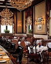 Amid the backdrop of dark wood paneled walls adorned with large portraits in oil, leather booths over which were hanging ornate chandeliers and a decidedly unhurried but efficient movement of people crowed in for 'Restaurant Week' in Philadelphia, stood Hotel Manager Grant Dipman waiting to welcome us to his flagship restaurant of